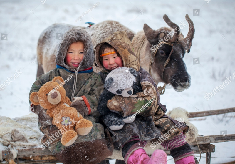 Reindeer with Children Smiling