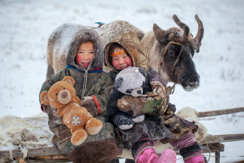 Reindeer with Children Smiling